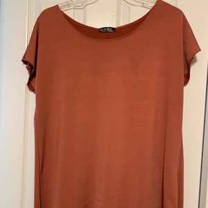 NWOT orange top with  asymmetrical hem size 1x